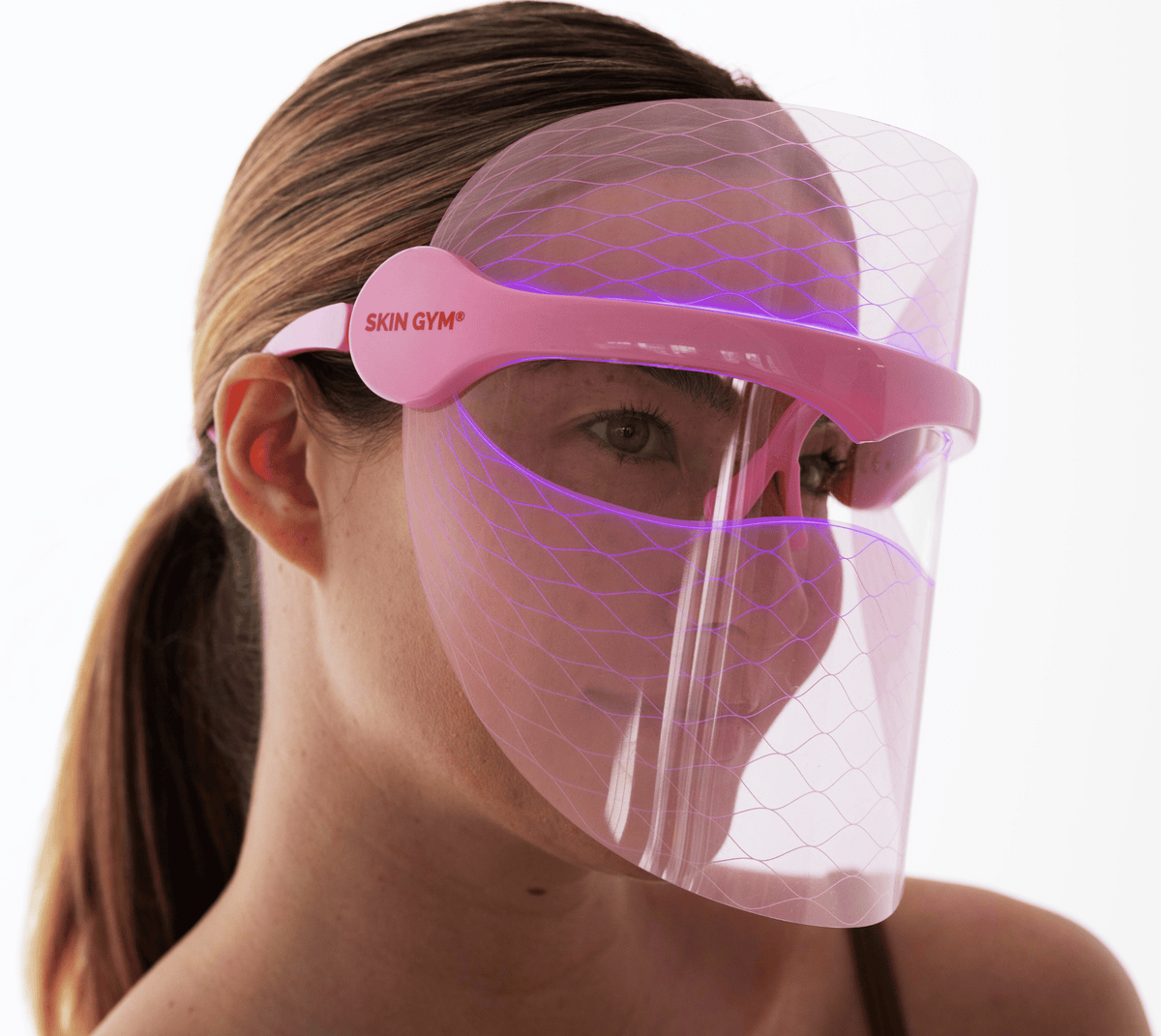 Girl using Blue Light Therapy Mask for Skincare